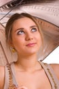 Young women with a silver umbrella Royalty Free Stock Photo