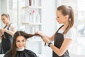 Young women sitting in beauty hair salon style