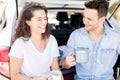 Couple enjoying a coffee break on car trip Royalty Free Stock Photo