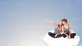 Young women sitting on cloud with copy space Royalty Free Stock Photo