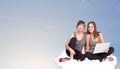 Young women sitting on cloud with copy space Royalty Free Stock Photo