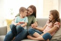 Young woman spending time with her children Royalty Free Stock Photo