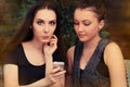 Young Women Surprised by Text Message Royalty Free Stock Photo