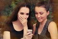 Young Women Surprised by Text Message Royalty Free Stock Photo