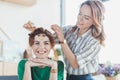 young women trying on handmade headband