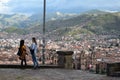 Young women from two worlds meet above Cusco