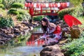 Young women wearing traditional Japanese kimono or yukata is happy and cheerful in the park Royalty Free Stock Photo