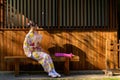 Young women wearing traditional Japanese kimono or yukata is happy and cheerful in the park Royalty Free Stock Photo