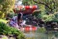 Young women wearing traditional Japanese kimono or yukata is happy and cheerful in the park Royalty Free Stock Photo