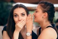 Gossiping Girl Telling Secrets to her Surprised Friend Royalty Free Stock Photo