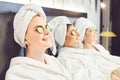 Young women in white bathrobe at a spa party Royalty Free Stock Photo