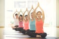 Young women yoga indoors keep calm and meditates while practicing yoga to explore the Inner Peace. Royalty Free Stock Photo