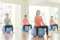 Young women yoga indoors keep calm and meditates while practicing yoga to explore the Inner Peace. Royalty Free Stock Photo