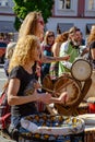 Young womens playing percusion drum