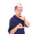 Young worker balancing pencil on his finger