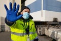 Young worker at express courier with Coronavirus protection mask