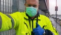 Young worker at express courier with Coronavirus protection mask Royalty Free Stock Photo