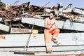 Young worker in a junkyard Royalty Free Stock Photo