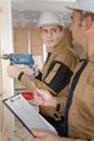 Young worker using electric drill Royalty Free Stock Photo