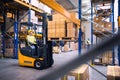 Young warehouse workers working together. Royalty Free Stock Photo