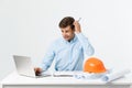 Young workman annoyed angry in furious gesture. Negative expression on white grey background