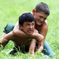 A young wrestler grimaces at the Kirkpinar Turkish Oil Wrestling Festival in Edirne in Turkey.