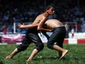 Young wrestlers battle for supremacy at the Elmali Turkish Oil Wrestling Festival at Elmali in Turkey.