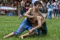 Young wrestlers battle for victory at the Velimese Turkish Oil Wrestling Festival in Turkey.