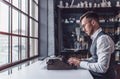 Young writer by the window Royalty Free Stock Photo