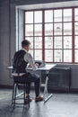 Young writer by the window Royalty Free Stock Photo