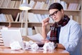 The young writer working in the library Royalty Free Stock Photo