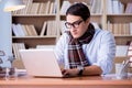 The young writer working in the library Royalty Free Stock Photo