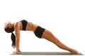 Young yoga female doing yogatic exercise Royalty Free Stock Photo