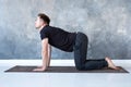 Young yogi men practices yoga asana bitilasana or cat cow pose Royalty Free Stock Photo