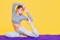 Young yogini woman stretching