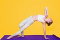 Young yogini woman stretching