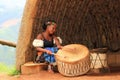 Young zulu woman playing drums in South Africa