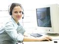 Young girl at helpdesk 2 Royalty Free Stock Photo