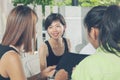 Younger asian woman friend talking with relaxing at home living Royalty Free Stock Photo