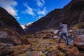 younger female photographer take a photograph in franz josef glacier important traveling destination in south island new zealand Royalty Free Stock Photo