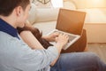 Happy young couple with laptop at home Royalty Free Stock Photo