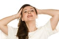 Youngs happy woman holding her hair on white Royalty Free Stock Photo