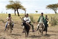 Youngsters keep race with donkeys in desert, Ethiopia