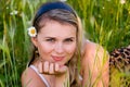 The young girl with a camomile Royalty Free Stock Photo