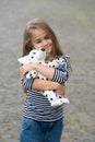 Because your baby deserves care. Happy child cuddle toy dog outdoors. Love and care. Play and development. Toy shop Royalty Free Stock Photo