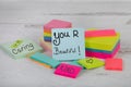 Your are caring beautiful kind inspiring messages on colorful posted notes Royalty Free Stock Photo