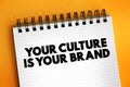 Your Culture Is Your Brand text on notepad, concept background