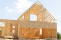 your dream home new residential construction house framing against a blue sky Royalty Free Stock Photo