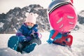 Your happy kid has ski or snowboard lesson at alpine school. Royalty Free Stock Photo