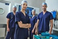 Your health is our number one priority. Portrait of a team of surgeons in a hospital.